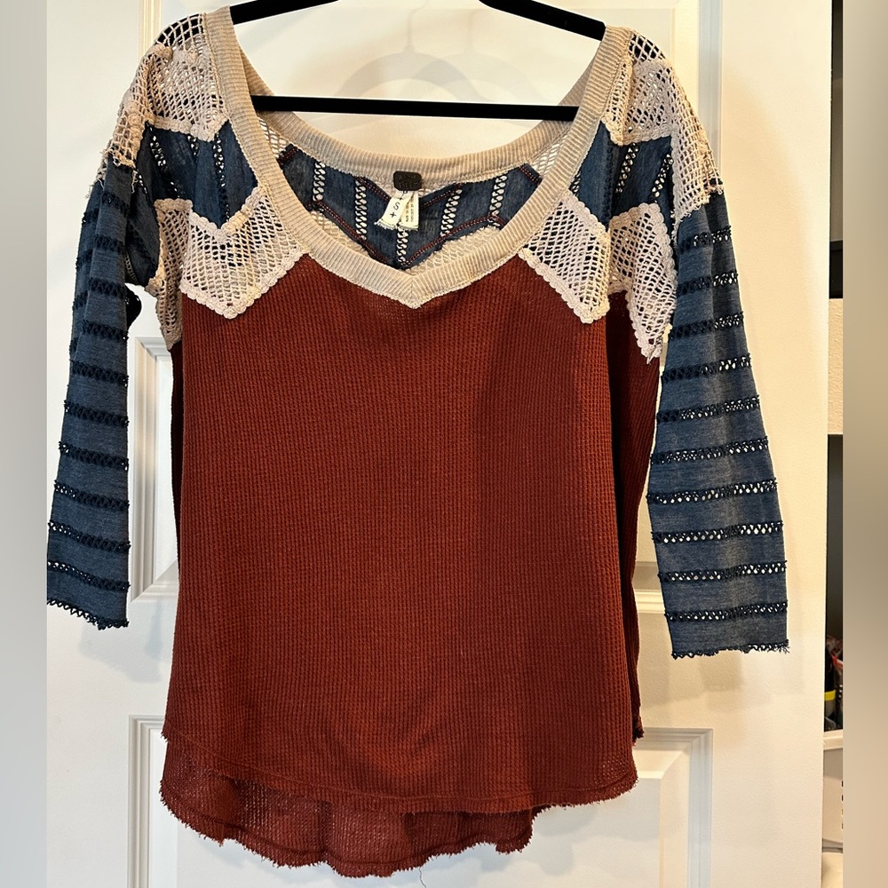 Free people - oversized - off the shoulder - 3/4 sleeves. Runs large.